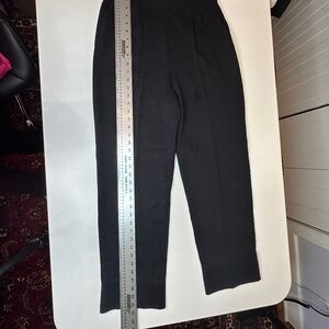 St John Black knit pants. Wool blend. Lined pockets Size 10 Good condition
